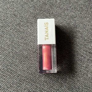 Tanais Lip Gloss- Brand New still sealed plumeria petals color